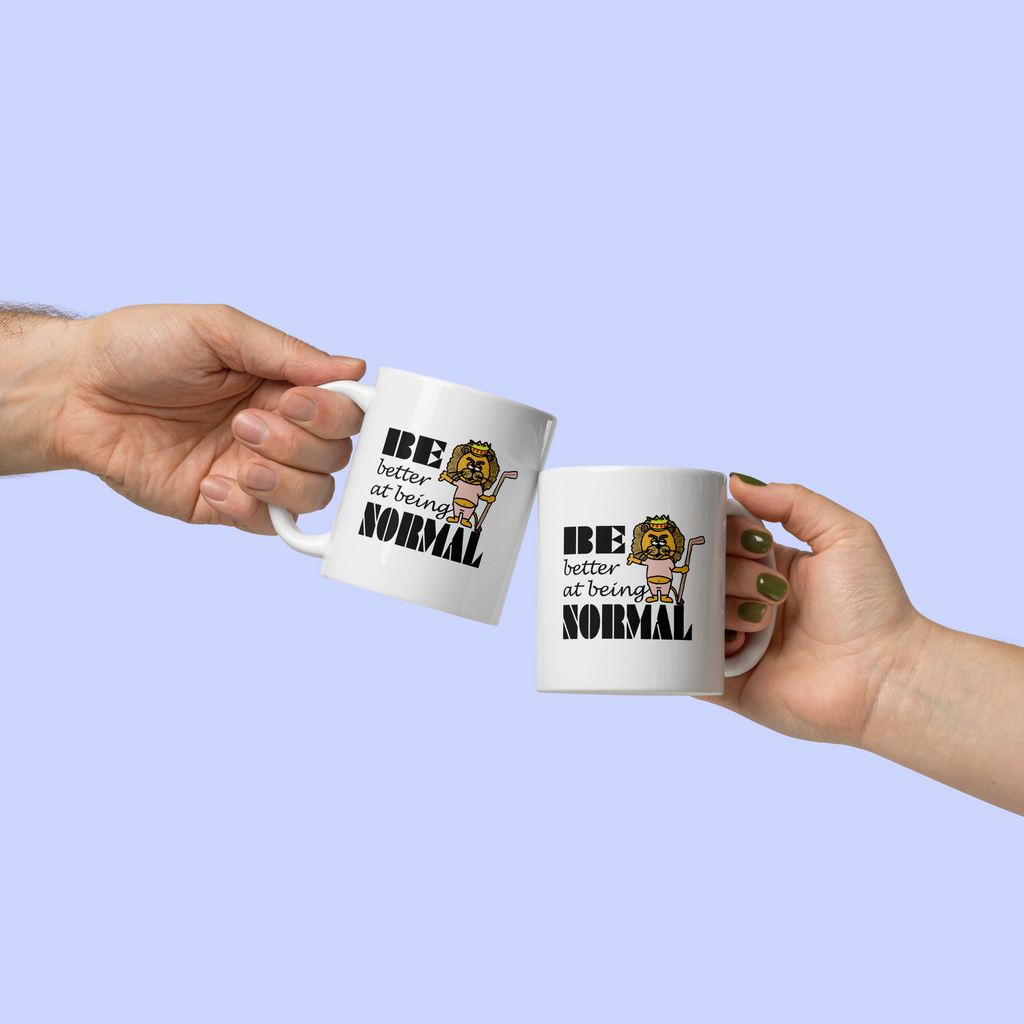 Sock Puppet Master "Be Better at Being Normal" Lion Mug